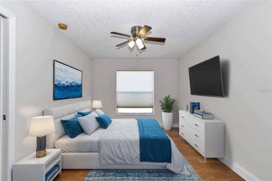 Nestled in an active 55+ community, this 3-bedroom, 2-bath home on Summerglen Country Club in Florida - for sale on GolfHomes.com, golf home, golf lot