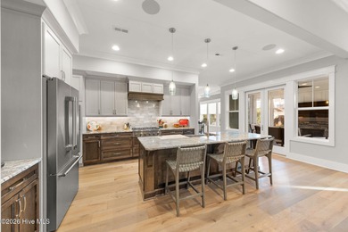 Designed by renowned builder George Crane and completed in 2023 on Members Club At St. James Plantation in North Carolina - for sale on GolfHomes.com, golf home, golf lot