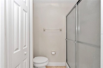 Nestled in an active 55+ community, this 3-bedroom, 2-bath home on Summerglen Country Club in Florida - for sale on GolfHomes.com, golf home, golf lot