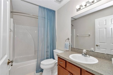 Nestled in an active 55+ community, this 3-bedroom, 2-bath home on Summerglen Country Club in Florida - for sale on GolfHomes.com, golf home, golf lot