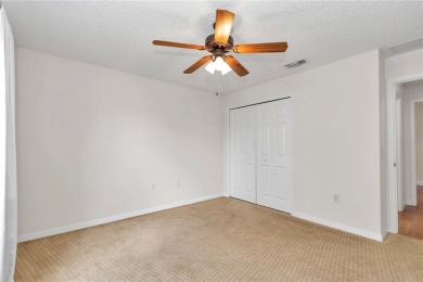 Nestled in an active 55+ community, this 3-bedroom, 2-bath home on Summerglen Country Club in Florida - for sale on GolfHomes.com, golf home, golf lot