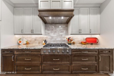 Designed by renowned builder George Crane and completed in 2023 on Members Club At St. James Plantation in North Carolina - for sale on GolfHomes.com, golf home, golf lot