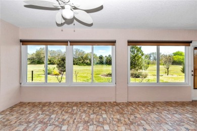 Nestled in an active 55+ community, this 3-bedroom, 2-bath home on Summerglen Country Club in Florida - for sale on GolfHomes.com, golf home, golf lot