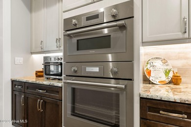 Designed by renowned builder George Crane and completed in 2023 on Members Club At St. James Plantation in North Carolina - for sale on GolfHomes.com, golf home, golf lot