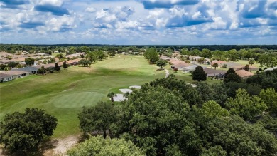 Nestled in an active 55+ community, this 3-bedroom, 2-bath home on Summerglen Country Club in Florida - for sale on GolfHomes.com, golf home, golf lot