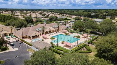 Nestled in an active 55+ community, this 3-bedroom, 2-bath home on Summerglen Country Club in Florida - for sale on GolfHomes.com, golf home, golf lot