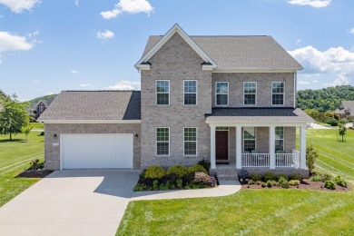 This beautiful two story all brick home with basement in Heron's on Pete Dye River Course of Virginia Tech in Virginia - for sale on GolfHomes.com, golf home, golf lot