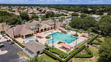 Nestled in an active 55+ community, this 3-bedroom, 2-bath home on Summerglen Country Club in Florida - for sale on GolfHomes.com, golf home, golf lot