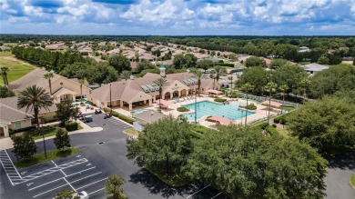 Nestled in an active 55+ community, this 3-bedroom, 2-bath home on Summerglen Country Club in Florida - for sale on GolfHomes.com, golf home, golf lot
