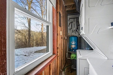 Welcome to 505 Natchez Lane, a lovely barn-style home on .95 on Hide-A-Way Hills Golf Club in Ohio - for sale on GolfHomes.com, golf home, golf lot