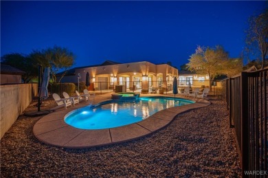 Welcome to 2838 Sidewheel Drive, an exceptional home in the on Laughlin Ranch Golf Club in Arizona - for sale on GolfHomes.com, golf home, golf lot