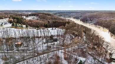 Welcome to 505 Natchez Lane, a lovely barn-style home on .95 on Hide-A-Way Hills Golf Club in Ohio - for sale on GolfHomes.com, golf home, golf lot