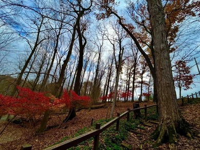 Welcome to 505 Natchez Lane, a lovely barn-style home on .95 on Hide-A-Way Hills Golf Club in Ohio - for sale on GolfHomes.com, golf home, golf lot