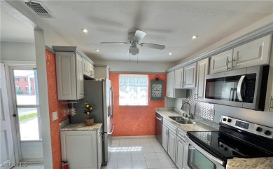 **BEAUTIFUL WIDE OPEN REMODELED KITCHEN WITH EXPANSIVE BREAKFAST on Myerlee Country Club in Florida - for sale on GolfHomes.com, golf home, golf lot