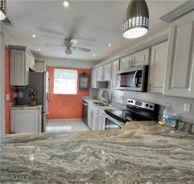 **BEAUTIFUL WIDE OPEN REMODELED KITCHEN WITH EXPANSIVE BREAKFAST on Myerlee Country Club in Florida - for sale on GolfHomes.com, golf home, golf lot