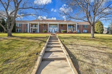 Enjoy easy living in this 2nd floor condo overlooking the on Greeley Country Club in Colorado - for sale on GolfHomes.com, golf home, golf lot