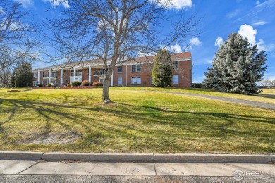 Enjoy easy living in this 2nd floor condo overlooking the on Greeley Country Club in Colorado - for sale on GolfHomes.com, golf home, golf lot