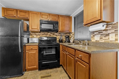 Beautiful, immaculate, and meticulously maintained home located on Six Lakes Country Club in Florida - for sale on GolfHomes.com, golf home, golf lot