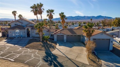 This stunning 1.5-story home offers 4 bedrooms and 2.5 bathrooms on Chaparral Golf and Country Club in Arizona - for sale on GolfHomes.com, golf home, golf lot