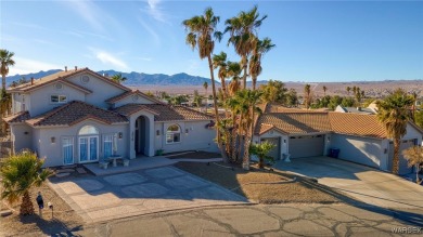 This stunning 1.5-story home offers 4 bedrooms and 2.5 bathrooms on Chaparral Golf and Country Club in Arizona - for sale on GolfHomes.com, golf home, golf lot