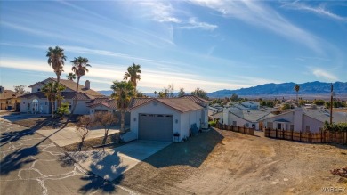 This stunning 1.5-story home offers 4 bedrooms and 2.5 bathrooms on Chaparral Golf and Country Club in Arizona - for sale on GolfHomes.com, golf home, golf lot