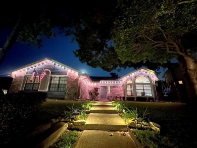 Amazing escape!  This gorgeous home is located in a large pocket on Mesquite Municipal Golf Course in Texas - for sale on GolfHomes.com, golf home, golf lot