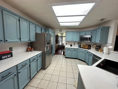 Amazing escape!  This gorgeous home is located in a large pocket on Mesquite Municipal Golf Course in Texas - for sale on GolfHomes.com, golf home, golf lot