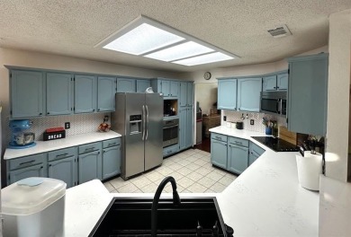 Amazing escape!  This gorgeous home is located in a large pocket on Mesquite Municipal Golf Course in Texas - for sale on GolfHomes.com, golf home, golf lot