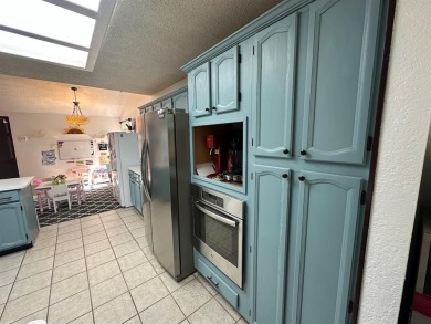 Amazing escape!  This gorgeous home is located in a large pocket on Mesquite Municipal Golf Course in Texas - for sale on GolfHomes.com, golf home, golf lot
