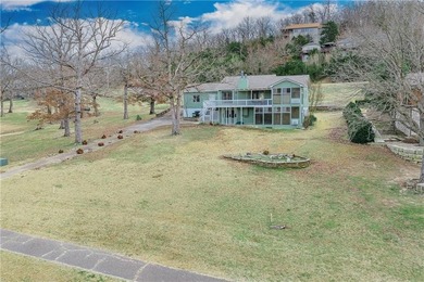 This beautifully updated home offers a prime golf course setting on Holiday Island Executive Golf Course in Arkansas - for sale on GolfHomes.com, golf home, golf lot