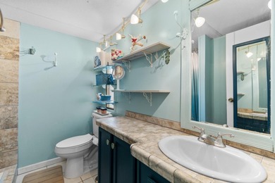 Welcome home to your easy going coastal escape in the on Barefoot Resort and Golf Club  in South Carolina - for sale on GolfHomes.com, golf home, golf lot