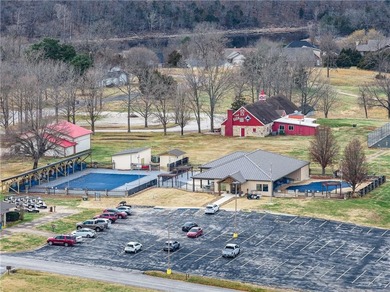 This beautifully updated home offers a prime golf course setting on Holiday Island Executive Golf Course in Arkansas - for sale on GolfHomes.com, golf home, golf lot