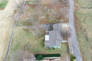 This beautifully updated home offers a prime golf course setting on Holiday Island Executive Golf Course in Arkansas - for sale on GolfHomes.com, golf home, golf lot