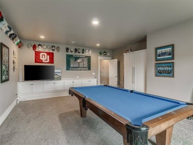 Nestled within the prestigious Oak Tree Golf and Country Club on Oak Tree National Golf and Country Club in Oklahoma - for sale on GolfHomes.com, golf home, golf lot