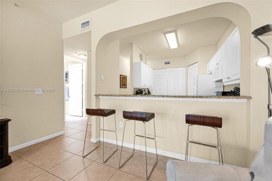 UNIQUE!!! First-floor corner unit in Palm Aire with golf course on Palm-Aire Country Club and Resort - The Oaks in Florida - for sale on GolfHomes.com, golf home, golf lot