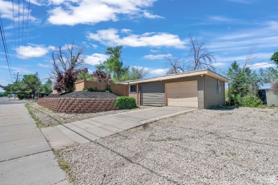 Back on the Market! Large home nestled in the heart of Sandy on Schneiters Pebble Brook Golf Course in Utah - for sale on GolfHomes.com, golf home, golf lot