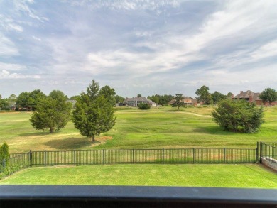 Nestled within the prestigious Oak Tree Golf and Country Club on Oak Tree National Golf and Country Club in Oklahoma - for sale on GolfHomes.com, golf home, golf lot