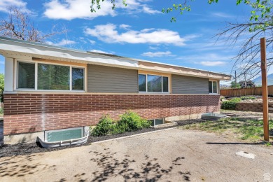 Back on the Market! Large home nestled in the heart of Sandy on Schneiters Pebble Brook Golf Course in Utah - for sale on GolfHomes.com, golf home, golf lot