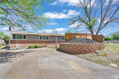 Back on the Market! Large home nestled in the heart of Sandy on Schneiters Pebble Brook Golf Course in Utah - for sale on GolfHomes.com, golf home, golf lot