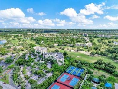 UNIQUE!!! First-floor corner unit in Palm Aire with golf course on Palm-Aire Country Club and Resort - The Oaks in Florida - for sale on GolfHomes.com, golf home, golf lot