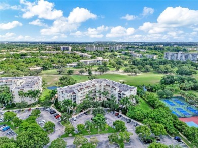 UNIQUE!!! First-floor corner unit in Palm Aire with golf course on Palm-Aire Country Club and Resort - The Oaks in Florida - for sale on GolfHomes.com, golf home, golf lot