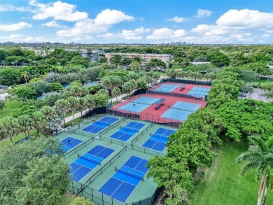 UNIQUE!!! First-floor corner unit in Palm Aire with golf course on Palm-Aire Country Club and Resort - The Oaks in Florida - for sale on GolfHomes.com, golf home, golf lot