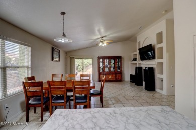 Location is key, and this beautifully situated home has on Sonoma Ranch Golf Course in New Mexico - for sale on GolfHomes.com, golf home, golf lot