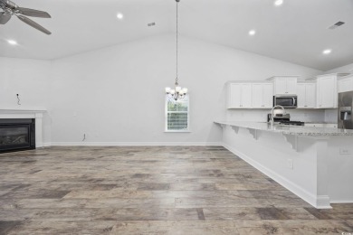Nestled in the sought after community of Murrells Inlet, this on International Club of Myrtle Beach in South Carolina - for sale on GolfHomes.com, golf home, golf lot