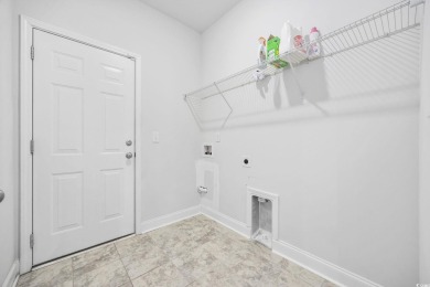 Nestled in the sought after community of Murrells Inlet, this on International Club of Myrtle Beach in South Carolina - for sale on GolfHomes.com, golf home, golf lot