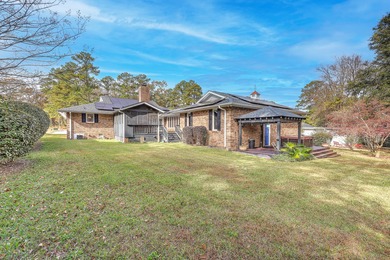 Welcome to this stunning and meticulously maintained 4-bedroom on Santee-Cooper Country Club in South Carolina - for sale on GolfHomes.com, golf home, golf lot