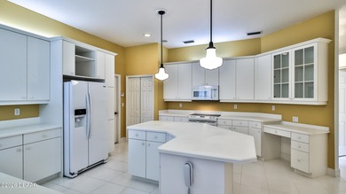 This home is located on the 14th Fairway. The views from the on Spruce Creek Golf Club in Florida - for sale on GolfHomes.com, golf home, golf lot