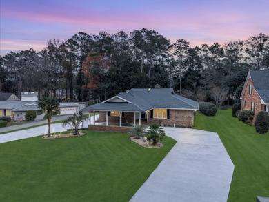 Welcome to this stunning and meticulously maintained 4-bedroom on Santee-Cooper Country Club in South Carolina - for sale on GolfHomes.com, golf home, golf lot