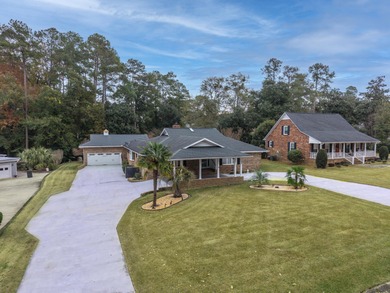Welcome to this stunning and meticulously maintained 4-bedroom on Santee-Cooper Country Club in South Carolina - for sale on GolfHomes.com, golf home, golf lot