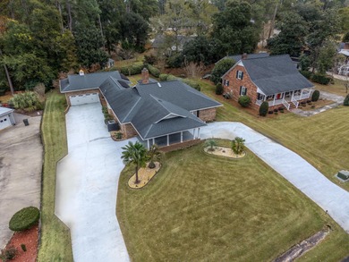 Welcome to this stunning and meticulously maintained 4-bedroom on Santee-Cooper Country Club in South Carolina - for sale on GolfHomes.com, golf home, golf lot